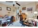 Well-lit home office featuring dual desk setups with ceiling fan and neutral wall paint at 4854 Myrtle View N Dr, Mulberry, FL 33860