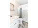 This bathroom offers a combined tub and shower, plus white fixtures and an updated vanity at 5316 Dorman Rd, Lakeland, FL 33813