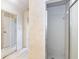 Bright bathroom with a walk-in shower and mirrored closet doors at 5316 Dorman Rd, Lakeland, FL 33813