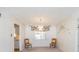 Dining area featuring a chandelier and view into the kitchen at 5316 Dorman Rd, Lakeland, FL 33813