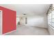 Open living room with neutral carpet and wall details at 5316 Dorman Rd, Lakeland, FL 33813