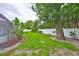 Backyard featuring a green lawn and privacy fence at 1034 Brighton Way, Lakeland, FL 33813