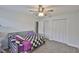 Cozy bedroom with a ceiling fan, closet, and ample natural light at 1034 Brighton Way, Lakeland, FL 33813