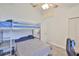 Bedroom featuring bunkbeds, desk space, ceiling fan, and neutral carpet at 1034 Brighton Way, Lakeland, FL 33813