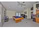 Game room featuring a pool table, desk, and cabinets, providing entertainment and storage at 1034 Brighton Way, Lakeland, FL 33813