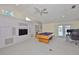 Large game room featuring a pool table, built-in shelving, and neutral carpet at 1034 Brighton Way, Lakeland, FL 33813