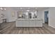 Bright kitchen features a large island, stainless steel appliances, and plenty of cabinet space at 1034 Brighton Way, Lakeland, FL 33813