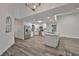 Open concept kitchen with stainless steel appliances and granite countertops at 1034 Brighton Way, Lakeland, FL 33813