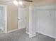 Cozy bedroom with plush carpeting and a spacious closet, offering a comfortable and private retreat at 5969 Nw 65Th St, Ocala,, FL 34482