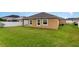 Spacious backyard featuring healthy green grass and a privacy fence, perfect for outdoor enjoyment at , Kissimmee, FL 34758
