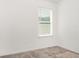 Bright bedroom featuring neutral paint, plush carpet, and a window with natural light at , Kissimmee, FL 34758