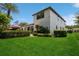 Spacious backyard with lush landscaping, an inviting pool area, and an outdoor seating area at 2242 Soaring Eagle Pl, Lake Mary, FL 32746