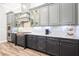 Well-appointed kitchen with modern appliances, gray cabinets, and updated countertops at 2242 Soaring Eagle Pl, Lake Mary, FL 32746