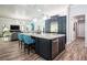 Open concept kitchen with a spacious island and modern appliances at 2242 Soaring Eagle Pl, Lake Mary, FL 32746