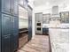 Modern kitchen with stainless steel appliances and custom cabinetry at 2242 Soaring Eagle Pl, Lake Mary, FL 32746