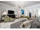 Bright living room with plush seating, stylish decor, and ample natural light at 2242 Soaring Eagle Pl, Lake Mary, FL 32746