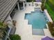 View of the pool with a sitting area and outdoor kitchen space at 2242 Soaring Eagle Pl, Lake Mary, FL 32746