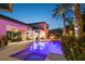 Stunning outdoor living space with a pool, covered patio, and outdoor kitchen at 2242 Soaring Eagle Pl, Lake Mary, FL 32746