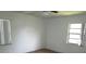 Bedroom featuring neutral walls and large windows at 5190 Starling Dr, Mulberry, FL 33860