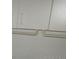 Close-up of a white shaker cabinet at 5190 Starling Dr, Mulberry, FL 33860