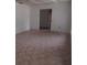 Spacious living room featuring tile floors and an open doorway at 5190 Starling Dr, Mulberry, FL 33860