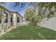 A well-maintained backyard with green grass and privacy fencing at 3067 Princewood Dr, Minneola, FL 34715