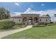View of the well-maintained community center on a sunny day at 3067 Princewood Dr, Minneola, FL 34715
