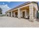 Inviting outdoor patio with stone pillars and ample seating at 3067 Princewood Dr, Minneola, FL 34715