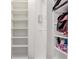 Organized walk-in closet with shelving, offering ample storage space at 3067 Princewood Dr, Minneola, FL 34715