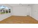 Bright living room featuring a window and hardwood floors at 8323 Sw 58 Loop, Ocala, FL 34481