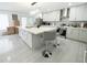Bright, open kitchen featuring a large center island and stainless steel appliances at 12844 Oulton Cir, Orlando, FL 32832