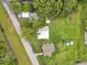 Aerial view of roof and yard at 1740 Inman Nw Dr, Winter Haven, FL 33881