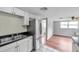 Kitchen featuring stainless steel refrigerator and sink at 1740 Inman Nw Dr, Winter Haven, FL 33881