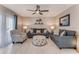 Cozy living room featuring neutral tones, comfortable seating, and stylish decor at 64 Alberta Ave, Ponce Inlet, FL 32127