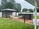 Backyard with hot tub, hammock, and gazebo, perfect for relaxation at 7144 Remington Oaks Loop, Lakeland, FL 33810