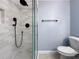 Shower room with sleek tile work, modern fixtures, and a glass enclosure at 1238 Honeytree E Ln, Lakeland, FL 33801