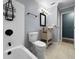 Modern bathroom featuring updated fixtures, including a rainfall shower head at 1238 Honeytree E Ln, Lakeland, FL 33801
