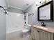 Updated bathroom featuring a shower-tub combo and a vanity with modern fixtures at 1238 Honeytree E Ln, Lakeland, FL 33801