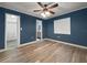 Bedroom boasting light-colored flooring and white trim, creating a bright and airy feel at 1238 Honeytree E Ln, Lakeland, FL 33801