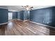 Spacious living room showcasing new floors, fresh paint, and trim at 1238 Honeytree E Ln, Lakeland, FL 33801