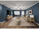 Welcoming living room with comfortable furnishings, natural light, and wood-look flooring at 1238 Honeytree E Ln, Lakeland, FL 33801