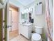 Bathroom with modern lighting, and a view to the bedroom at 449 Moscato Dr, Davenport, FL 33897