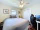 Bedroom featuring a full bed, ceiling fan, window and closet at 449 Moscato Dr, Davenport, FL 33897