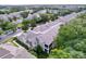 Beautiful townhouse community with lush landscaping, manicured lawns, and mature trees at 776 Grasslands Village Cir # 776, Lakeland, FL 33803