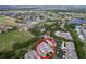 Aerial view of community featuring well-maintained residences, lush landscaping, and surrounding amenities at 776 Grasslands Village Cir # 776, Lakeland, FL 33803