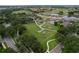 Expansive community greenspace with meticulously maintained landscaping, meandering walkways, and lush surroundings at 776 Grasslands Village Cir # 776, Lakeland, FL 33803