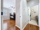 Hallway leading to bedroom with bunk beds and a laundry room at 776 Grasslands Village Cir # 776, Lakeland, FL 33803