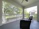 Relaxing screened patio with view of the neighborhood at 776 Grasslands Village Cir # 776, Lakeland, FL 33803