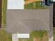Birds-eye view of roof with a well maintained yard, driveway, RV and other exterior details at 3983 Shay Dr, Bartow, FL 33830