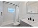 Bathroom featuring subway tile in the shower, modern fixtures, and a sleek vanity with ample storage at 3983 Shay Dr, Bartow, FL 33830